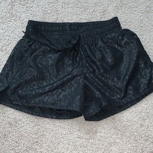 Black cheetah shorts